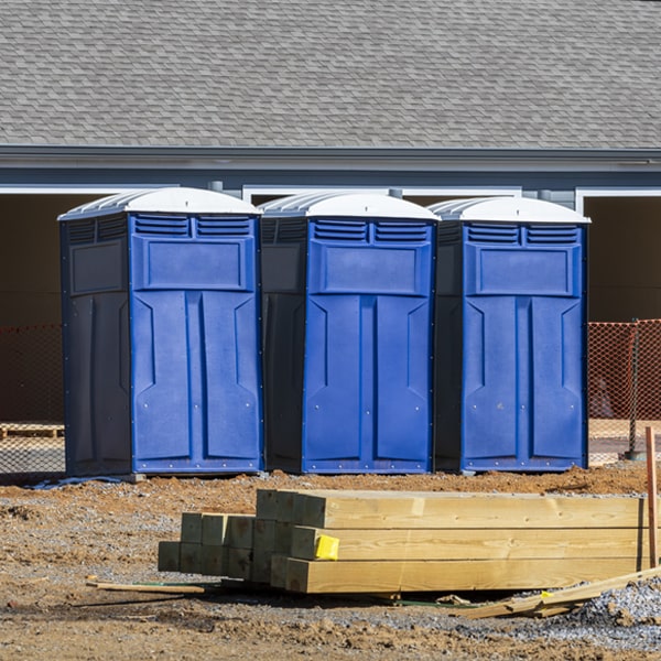 what is the cost difference between standard and deluxe portable restroom rentals in Bailey